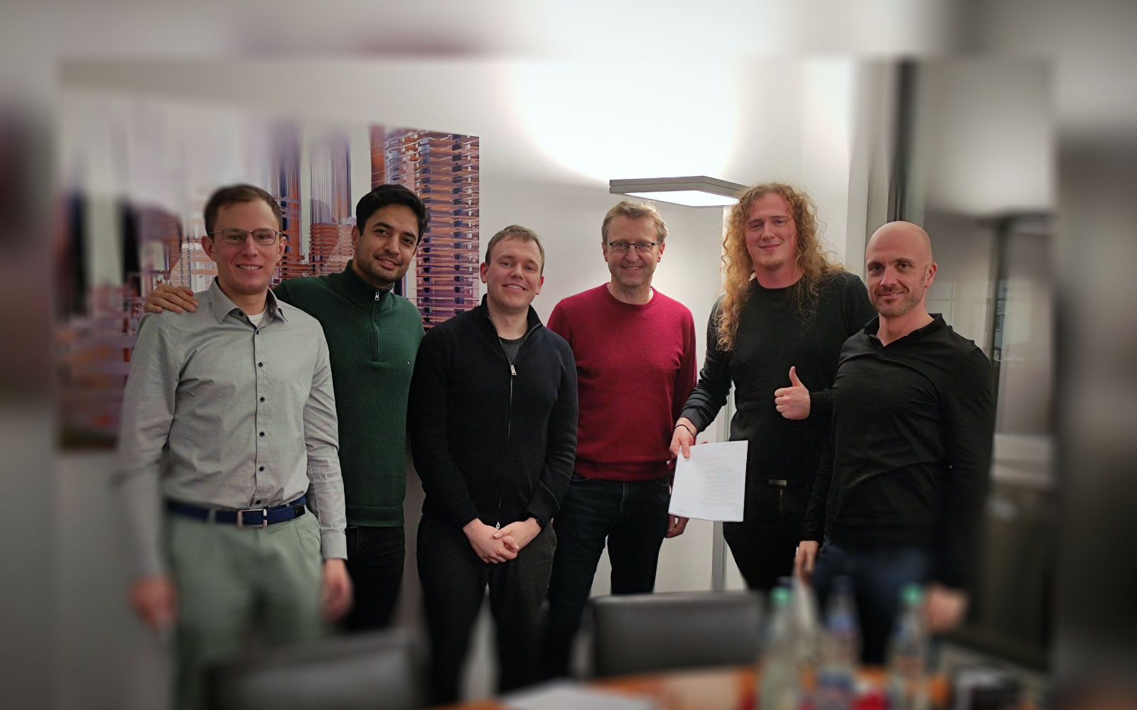 Photo of Raphael, Ramin, Lukas, Florian, Steffen and Ruben at the notary.