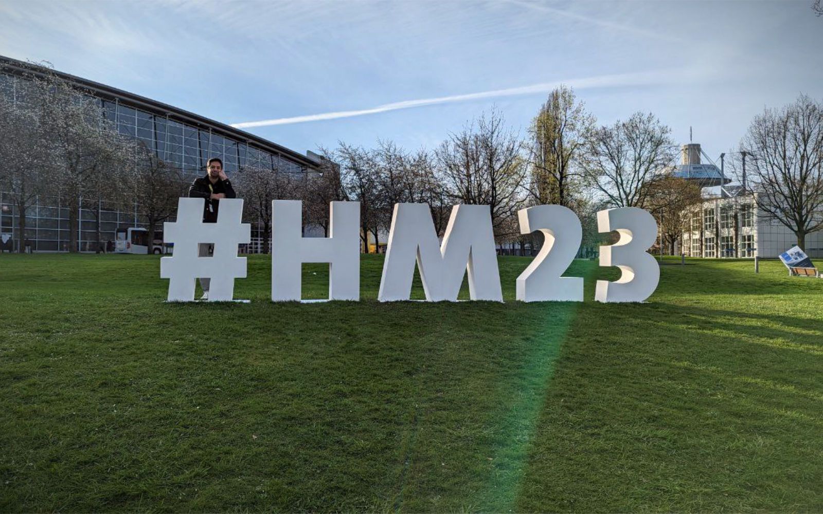 Ramin next to a sculpture at Hannover Messe